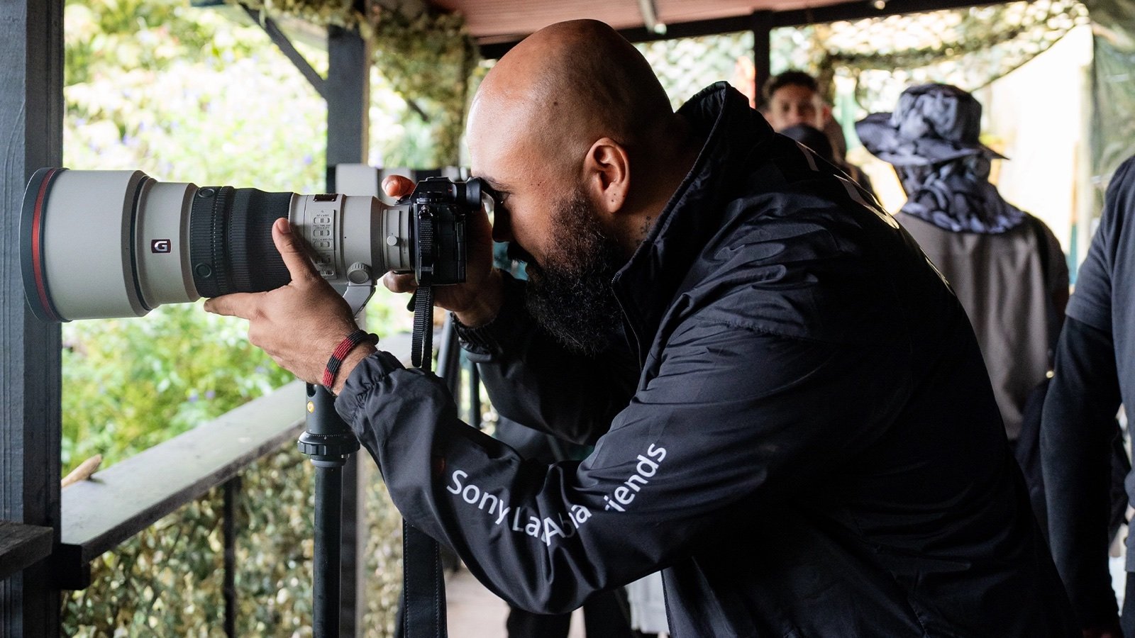 Jhonattan Vanegas photographing wildlife in the field